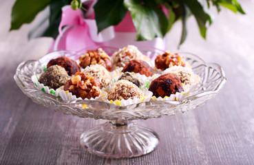 Assorted homemade sweet balls on plate,