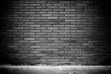 Empty grunge urban street brick wall texture background. Black and white effect.