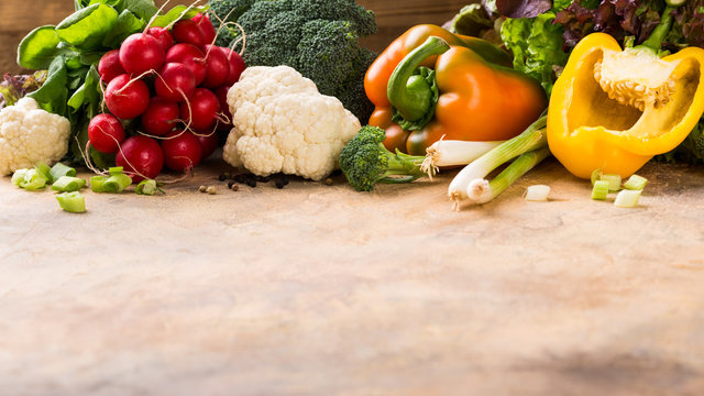 Organic healthy food background concept. Fresh raw colorful vegetables. Copy space.