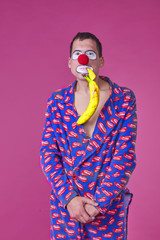 Clown in pajamas background isolated