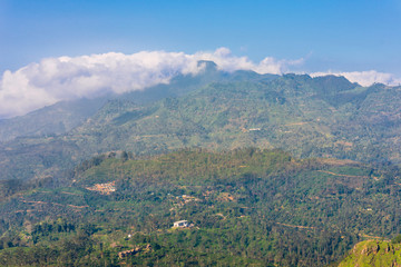 Fototapeta na wymiar The Namunukula mountain seen from the Ella rock, a famous viewpoint approx 1400m high, close to the small town Ella, located in the Uva province of Sri Lanka