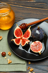 Fig isolated on wooden background