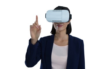 Businesswoman gesturing while using virtual reality headset