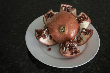 Pomegranate with Cut off Top on Top