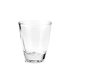 Empty glass for alcohol on the white background