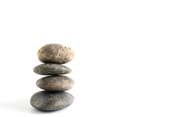 Fototapeta na wymiar Stack of stones balancing isolated on white background