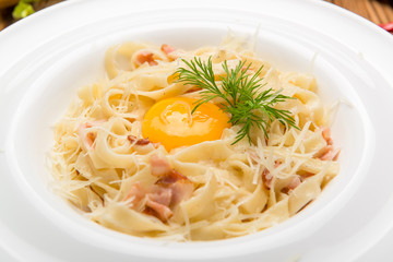 Spaghetti alla carbonara. beautiful and tasty food on a plate