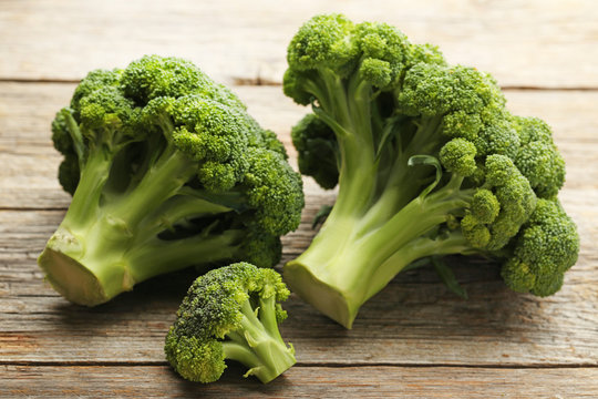 Broccoli on grey wooden table