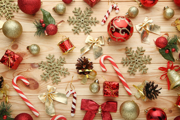 Christmas decorations with candy cane on brown wooden table