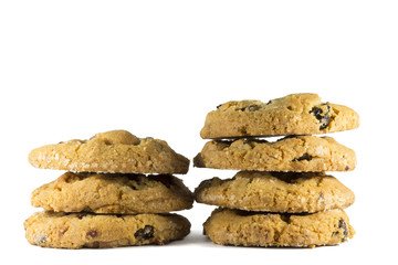 Isolated сhocolate chip cookies. Seven delicious cookies isolated on white background with a clipping path. Close up side view.