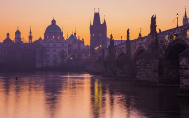 Fototapeta na wymiar Beautiful morning in Prague. Charles Bridge and Vltava River at dawn 