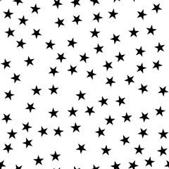 Fototapeta premium Black stars seamless pattern on white background. Awesome endless random scattered black stars festive pattern. Modern creative chaotic decor. Vector abstract illustration.
