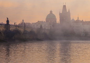 Beautiful morning in Prague. Charles Bridge and    Vltava River at dawn 