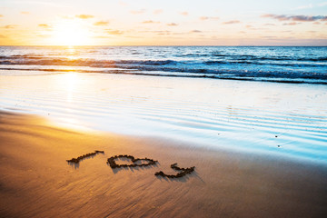 I love you on sand beach