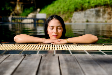 Woman enjoy relaxing in the pool