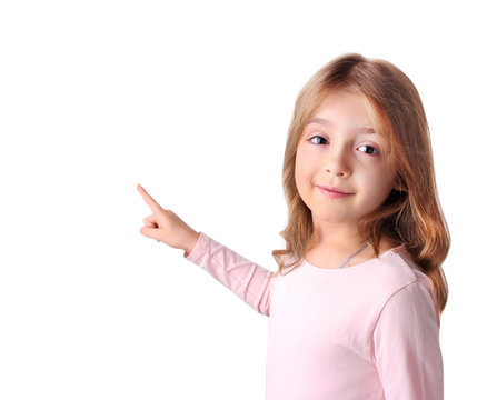 Caucasian Girl Portrait Isolated. Child Pointing With Finger Empty Space.