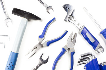 New working tools on a white background (hammer, keys, screwdriver, pliers, imbus)