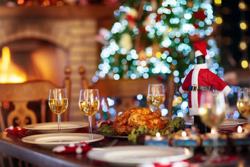 Christmas dinner at fire place and Xmas tree.