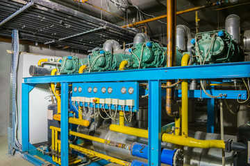 The pumping station has a plurality of tubes, motors, instrumentation.