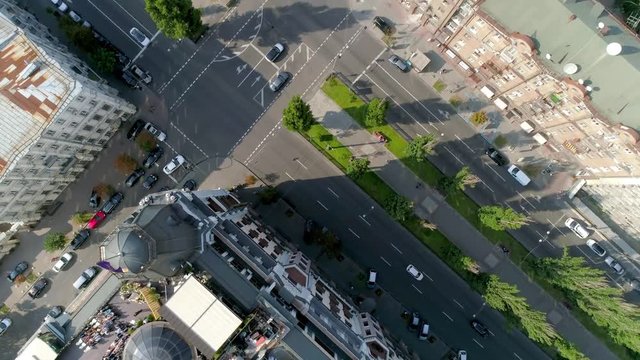 Aerial footage. Flight over the city of Kiev. Summer sunny evening. Old houses from the top.