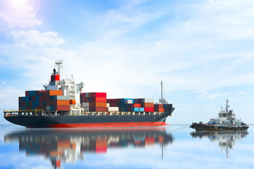 ship with container vessel and pilot import export cargo to international container yard on blue sky background.
