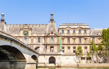 Fototapeta na wymiar View of the Louvre Museum and Carousel bridge. Paris, France