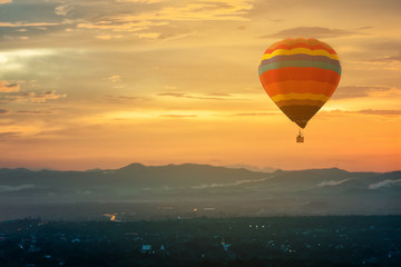 Hot air balloon in the sky sunset background