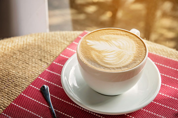 Cup of coffee with beautiful Latte art.