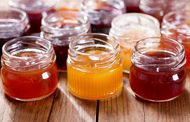 various jars of fruit jam