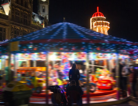 Blurred motion carousel decorated for Christmas in the center of Ghent, Belgium