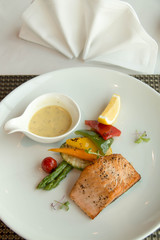  Fresh grilled salmon steak slices and sauce