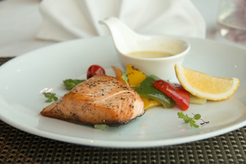  Fresh grilled salmon steak slices and sauce
