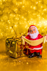 Christmas decoration on golden bokeh background. Macro photo