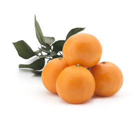 Orange mandarin and green leaves on a white background