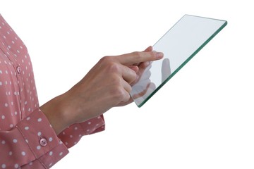 Woman using glass digital tablet 