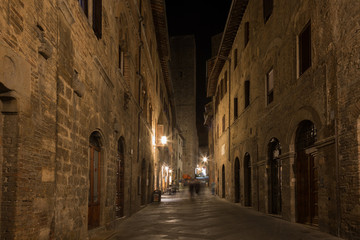 Medieval streets of San Gimignano at night, Tuscany, Italy