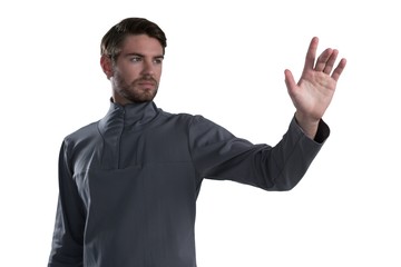 Fototapeta premium Man pretending to touch an invisible screen