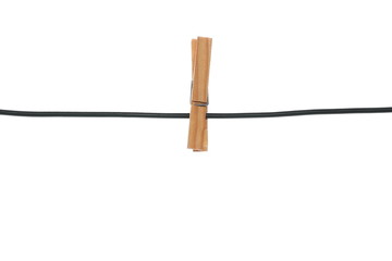 Old wooden clothespins on a rope isolated on white background
