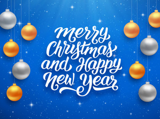 Merry Christmas and Happy New Year seasons greetings text on blue background with sparkles and colorful hanging balls. Vector illustration for holidays with lettering