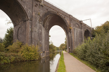 Fototapeta na wymiar Old train bridge made of red bricks masonry