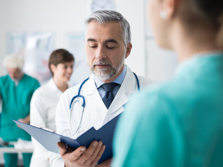 Doctor examining a patient's medical records