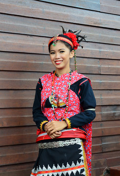 Portrait of Beautiful Malaysia Borneo Native Girl in Traditional Costumes.