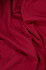 Synthetic raspberry fabric with a smooth surface and gloss