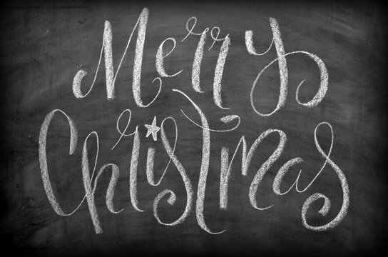 MERRY CHRISTMAS chalk lettering on blackboard