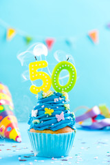 Fiftieth 50th birthday cupcake with candle blow out.Card mockup.