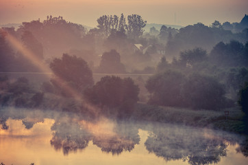 Foggy morning over Vistula river near Krakow, Poland
