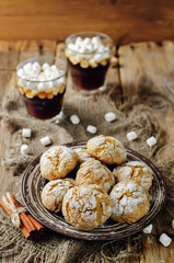 Pumpkin cookies with cups of coffee