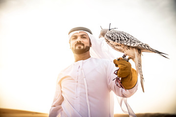Arabic man in the desert with his hawk