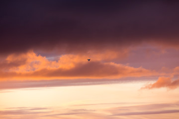 Flying drone over sea and cloud sky