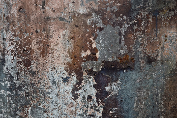 Old dirty concrete grungy wall background with peeled paint